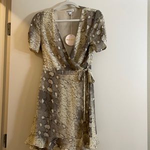 Wild Honey NWT Short Sleeve Snakeprint Wrap Dress with ruffle buttom Size S